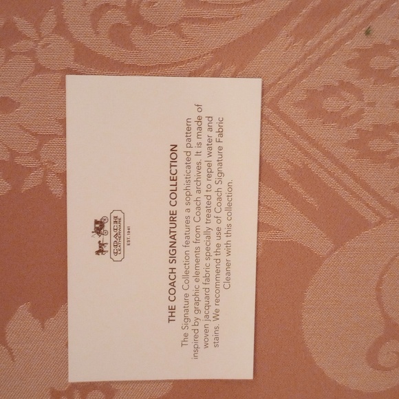 Nwt. Coach Signature C Brown and tan wristlet. - Picture 4 of 6